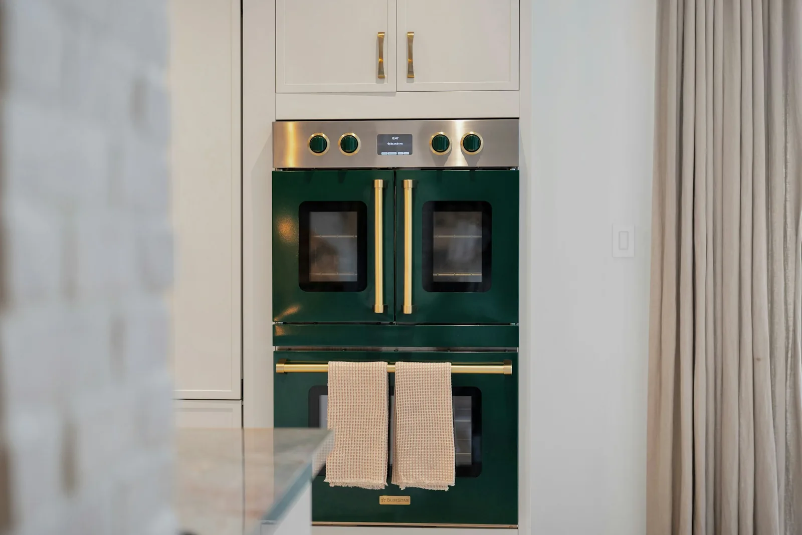 Forge Kitchen visual of a green oven wall
